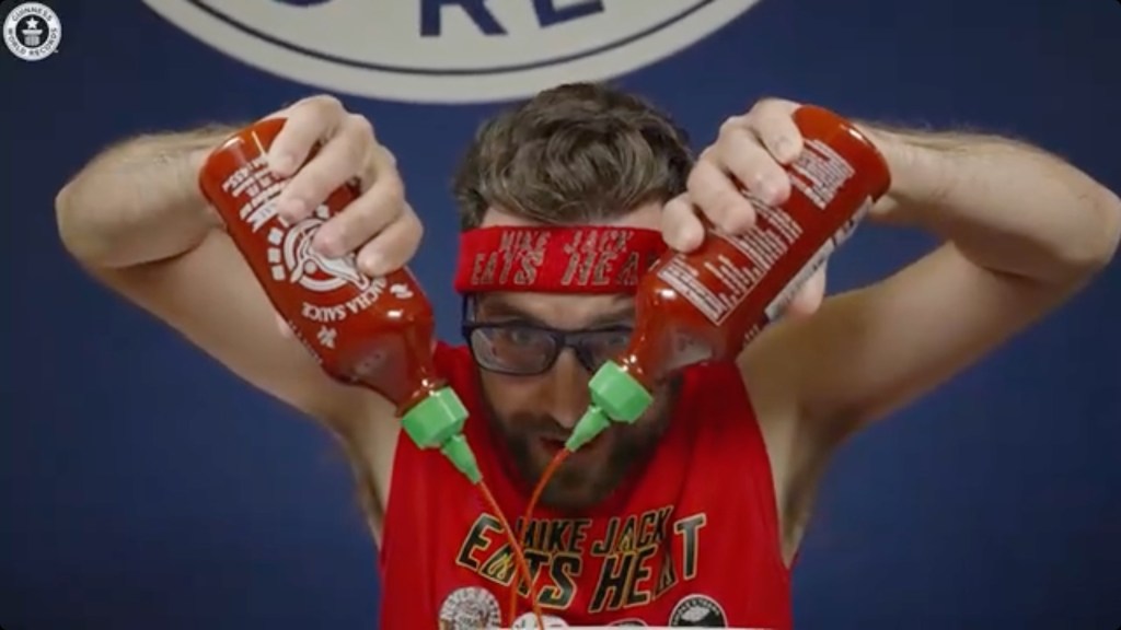 Spicy speed eater Mike Jack trying to break the record for the hottest sauce eaten in three minutes